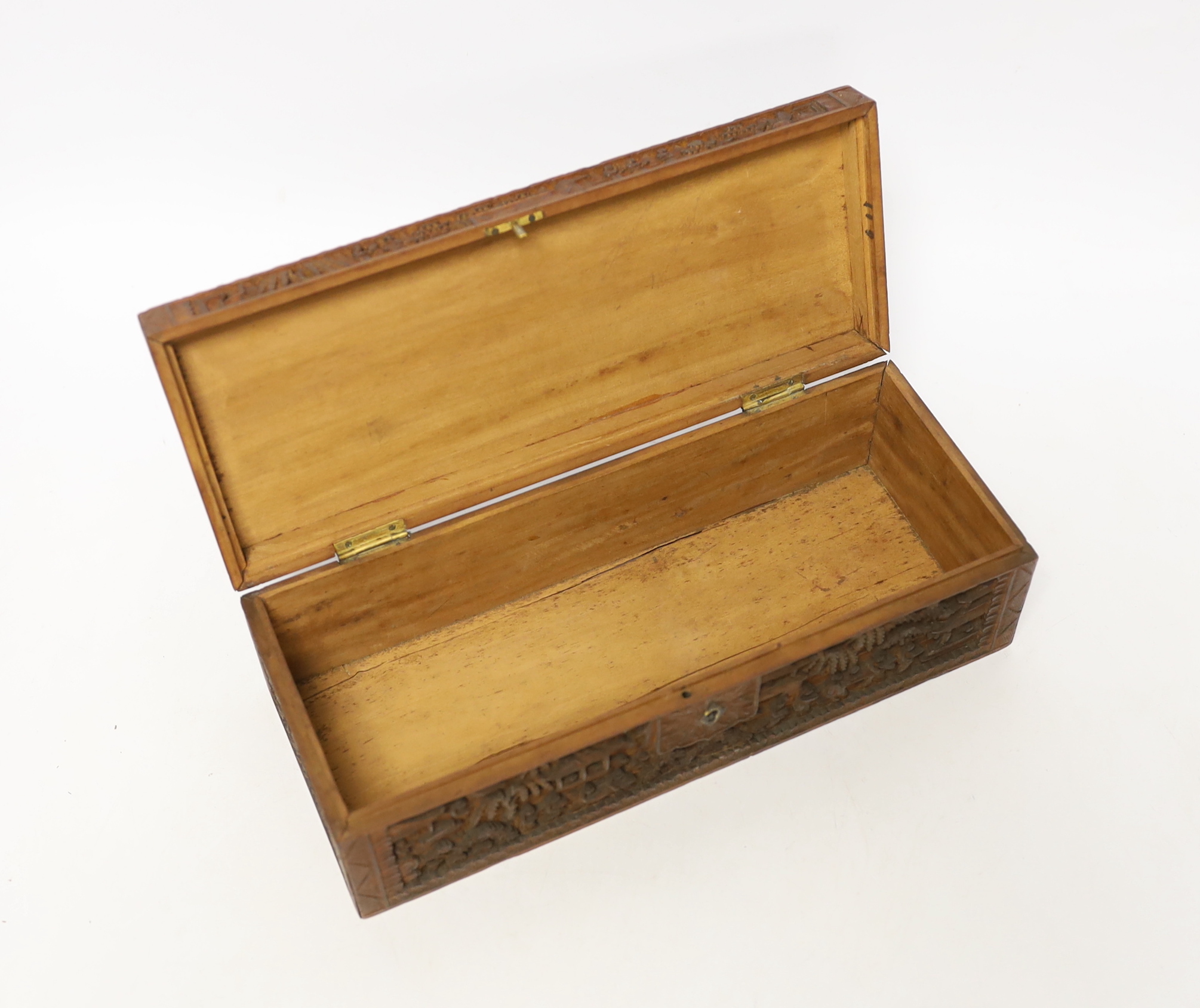A 19th century Chinese carved boxwood box, an amboyna cigarette box and three others